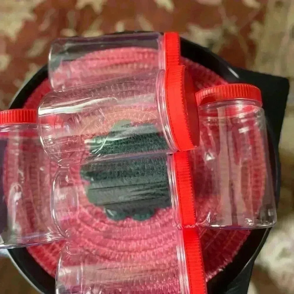Set of 6 plastic containers clear with red lid 6.5 in height 11.5 width of jar